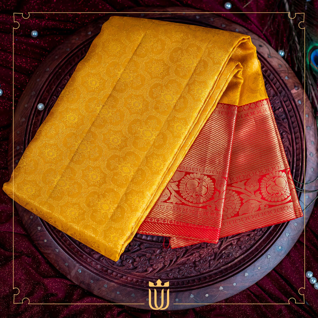 yellow saree with red border