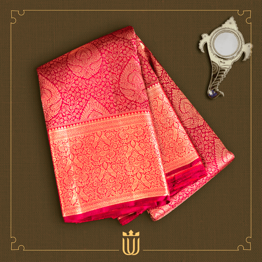 Red Saree with Traditional Motifs