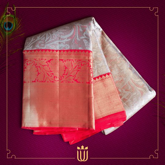 white saree with orange border