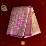 gold saree with magenta border