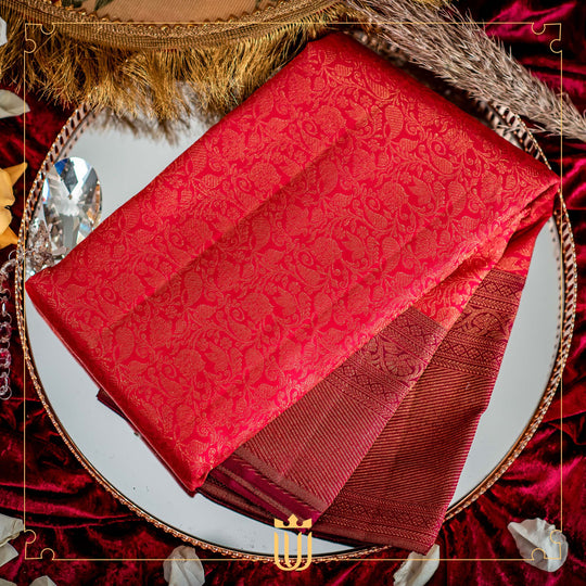 red saree with embossed golden flower