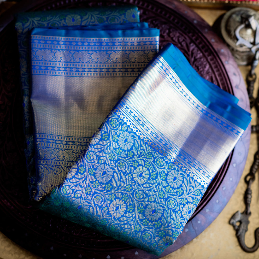 Peacock Blue Kanchipuram Silk in Self-Embossed Floral Designs