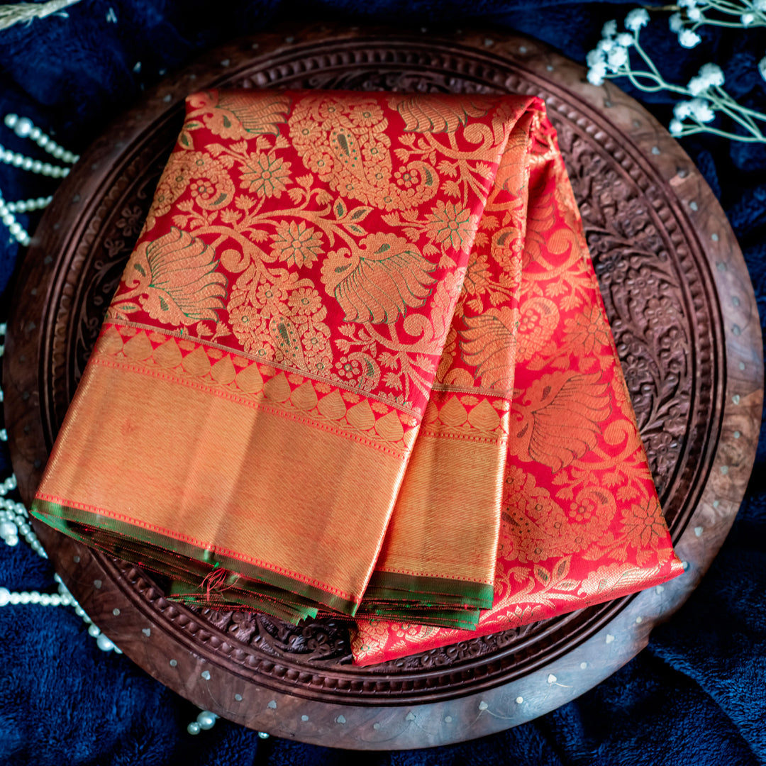 red saree with floral motifs